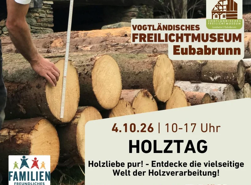 Plakatmotiv für den Holztag im Freilichtmuseum Eubabrunn sind geschichtete Holzstämme, die mit Zollstock vermessen werden.