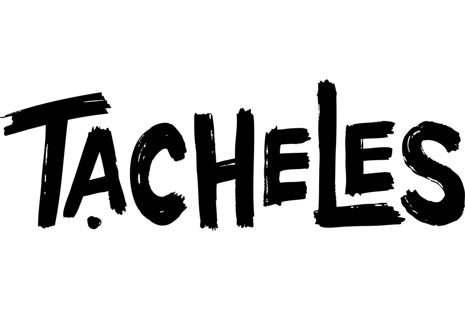 Jahr der jüdischen Kultur in Sachsen 2026 Wortmarke in Schwarz auf weißem Grund, die das Wort "Tacheles" in Graffiti-artigen Großbuchstaben bildet